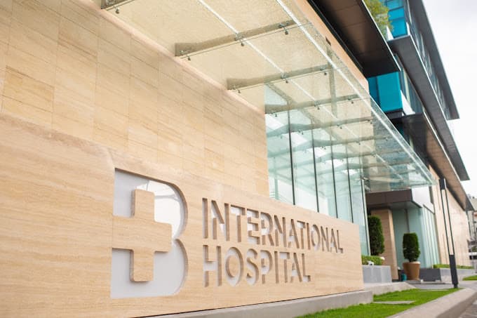 Stone facade with Bangkok International Hospital sign
