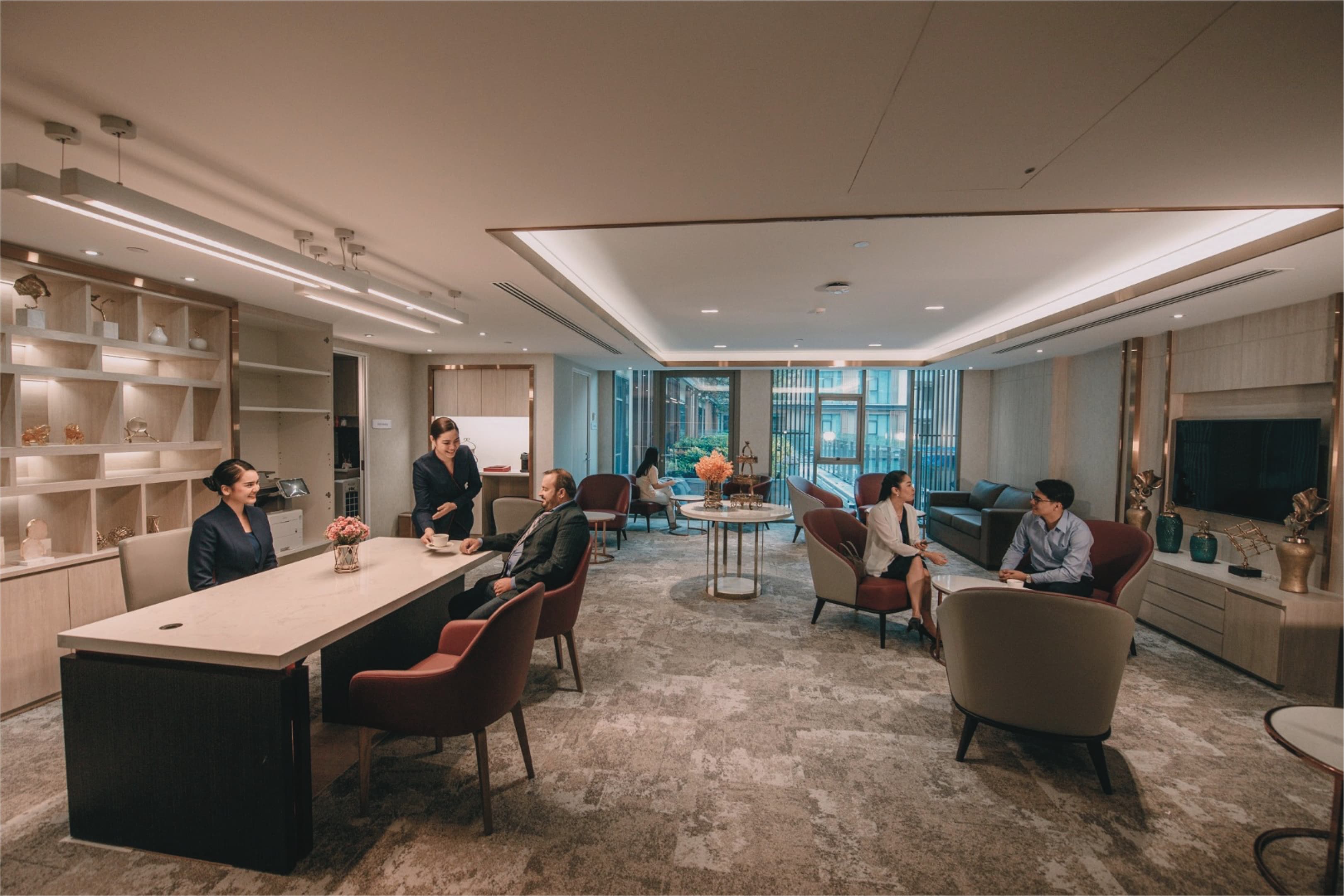 Reception lounge with visitors and staff at Bangkok International Hospital